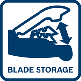 灰色の表面にある 2 つの交換用ブレードの横に開いたコンパートメントがあるユーティリティ ナイフ。.